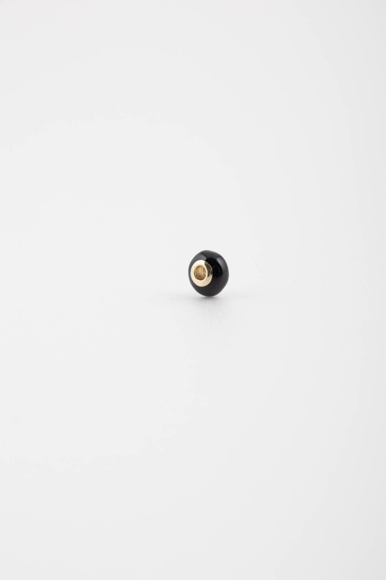 Charm oro nero