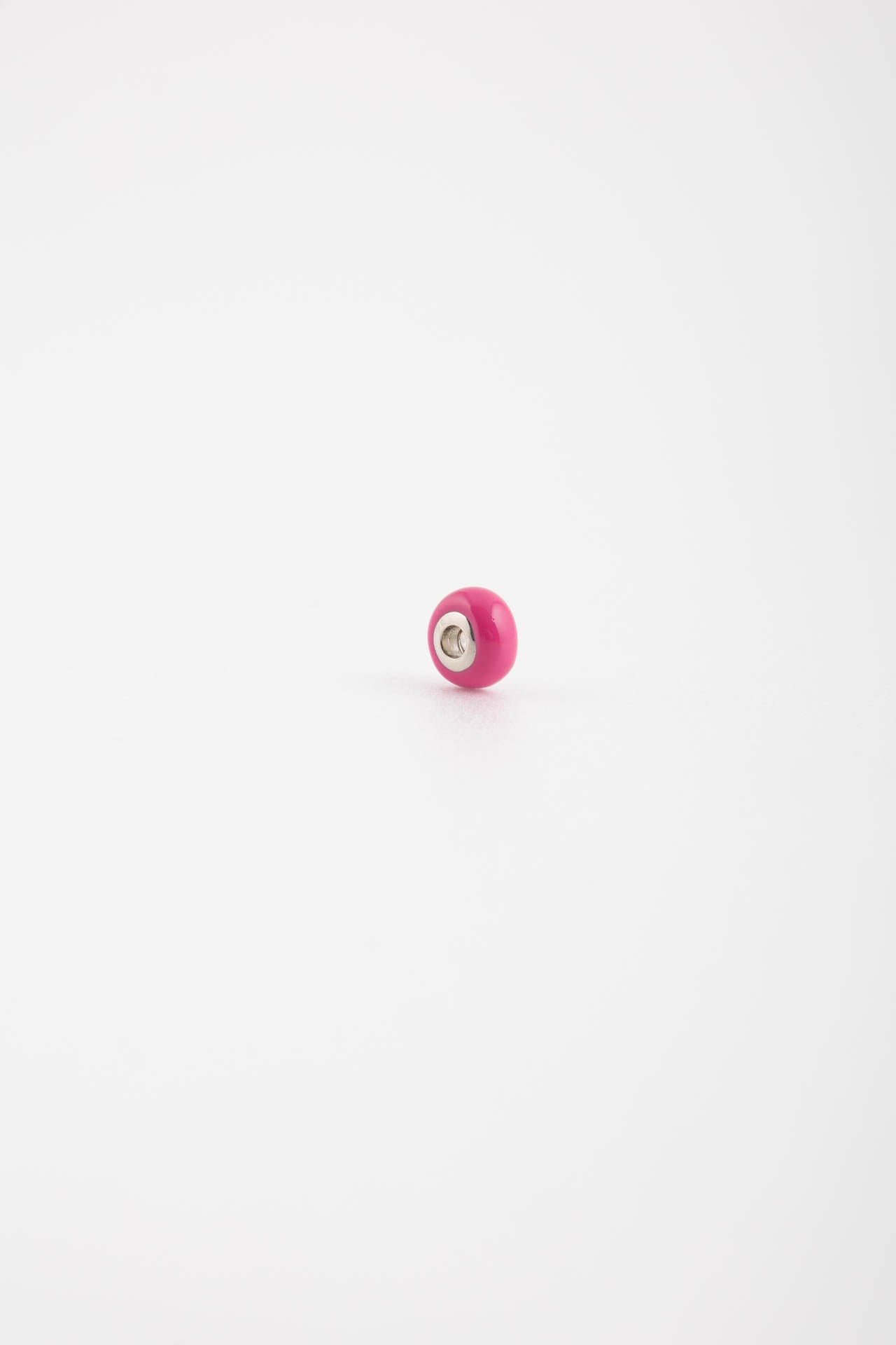 Charm acciaio fuxia